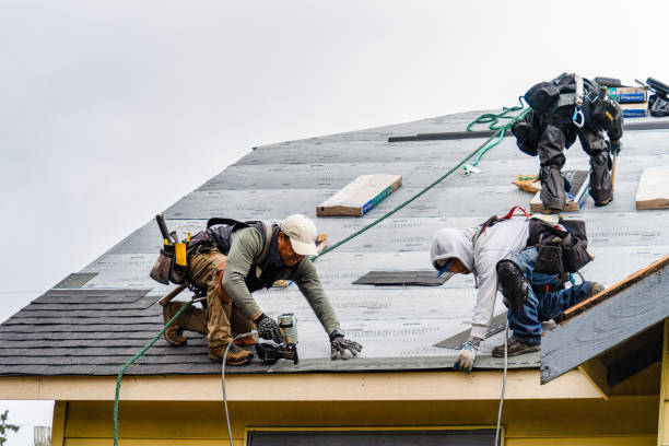 Professional Gutter Installation technician working in Mastic Beach, NY